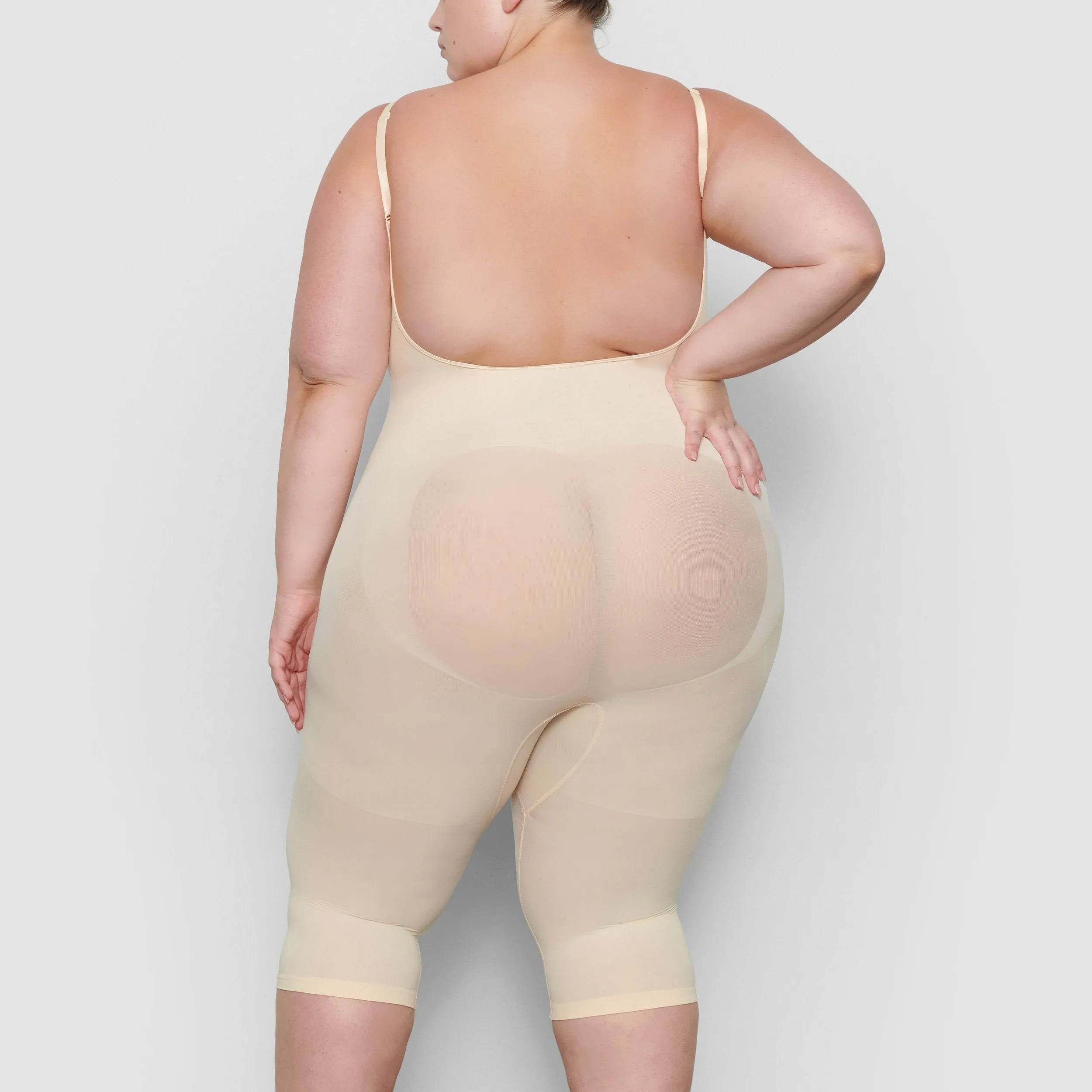 SEAMLESS SCULPT LOW BACK BODYSUIT WITH HOSIERY LEG | SAND